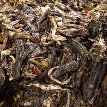 Juņnaņas Pu 'er Tea Pagatavotas Tējas Xishuangbanna 357g Qizi Tējas Kūka Vairumtirdzniecības Nannuoshan Veco Koku Tējas Izejvielas Tējas Yunnan Salocīts Izskats
